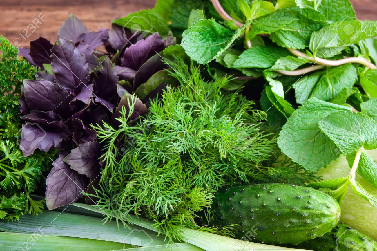 Fresh green vegetables on a wooden background - 38305593 Fresh green vegetables on a wooden background - 38305593