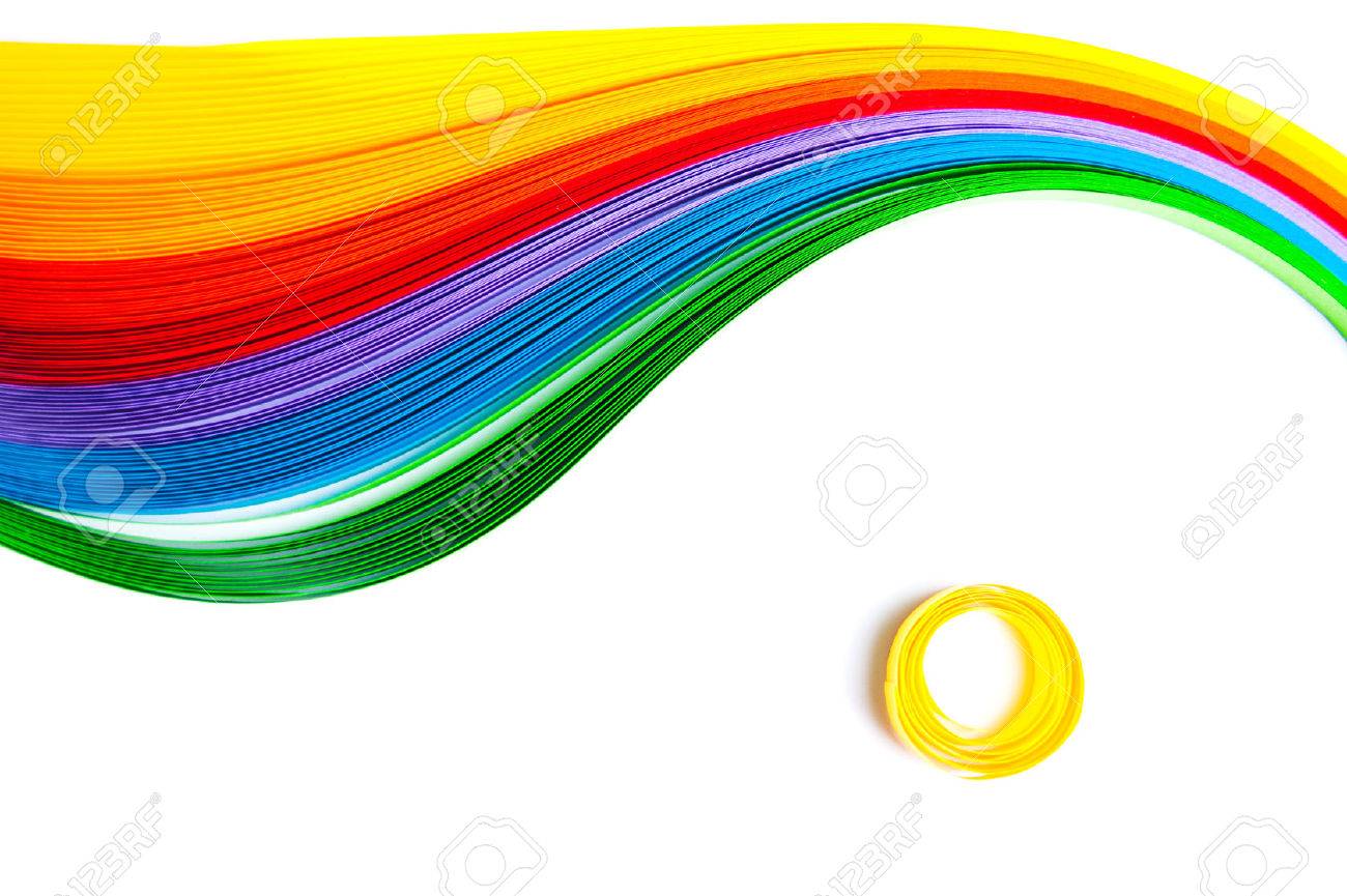 Rainbow colored quilling paper laid out in waves and shapes - 42115551 Rainbow colored quilling paper laid out in waves and shapes - 42115551
