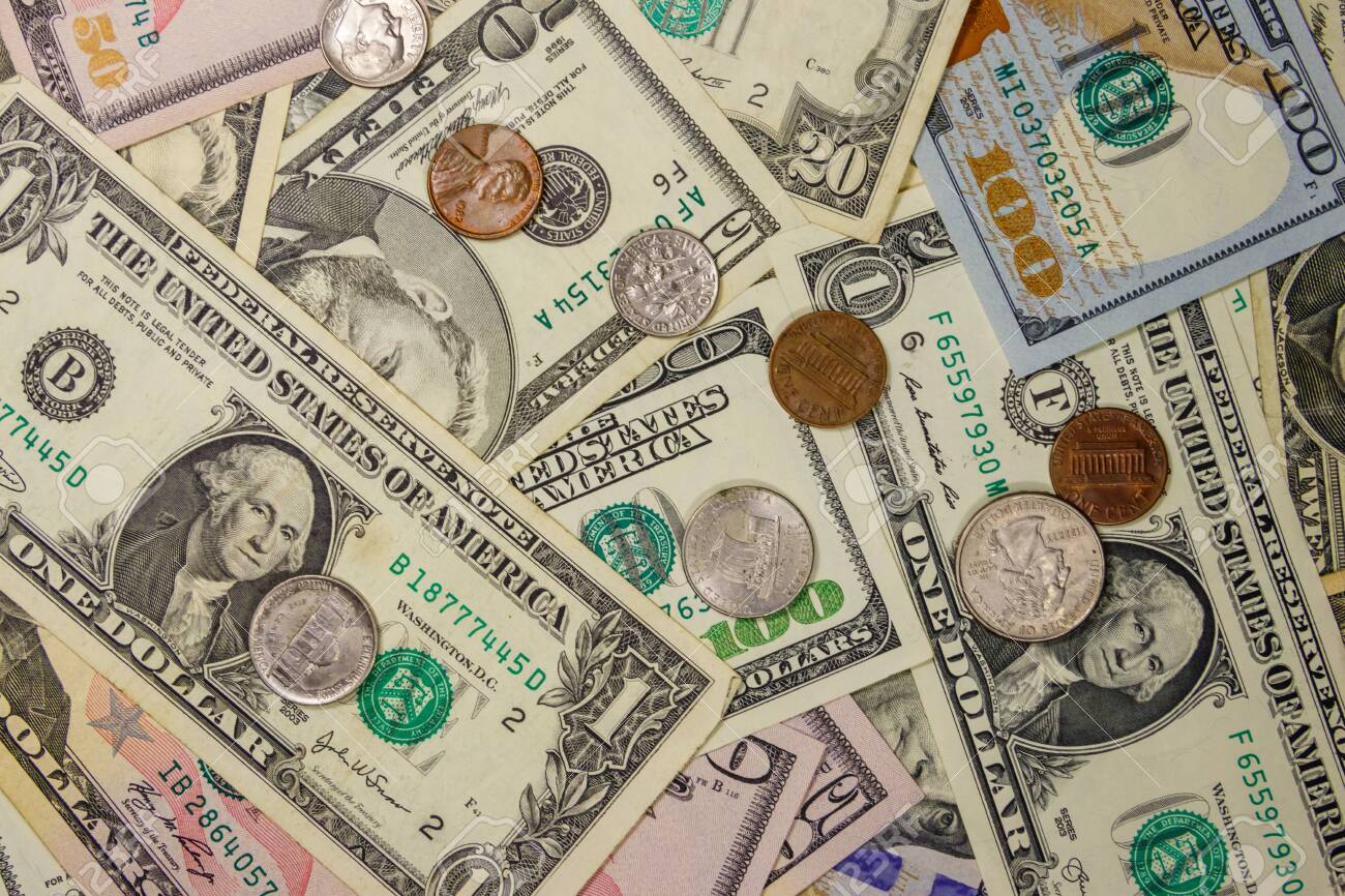 Background Of Different American Dollars Bills And Coins Stock Photo Picture And Royalty Free Image Image 130815433