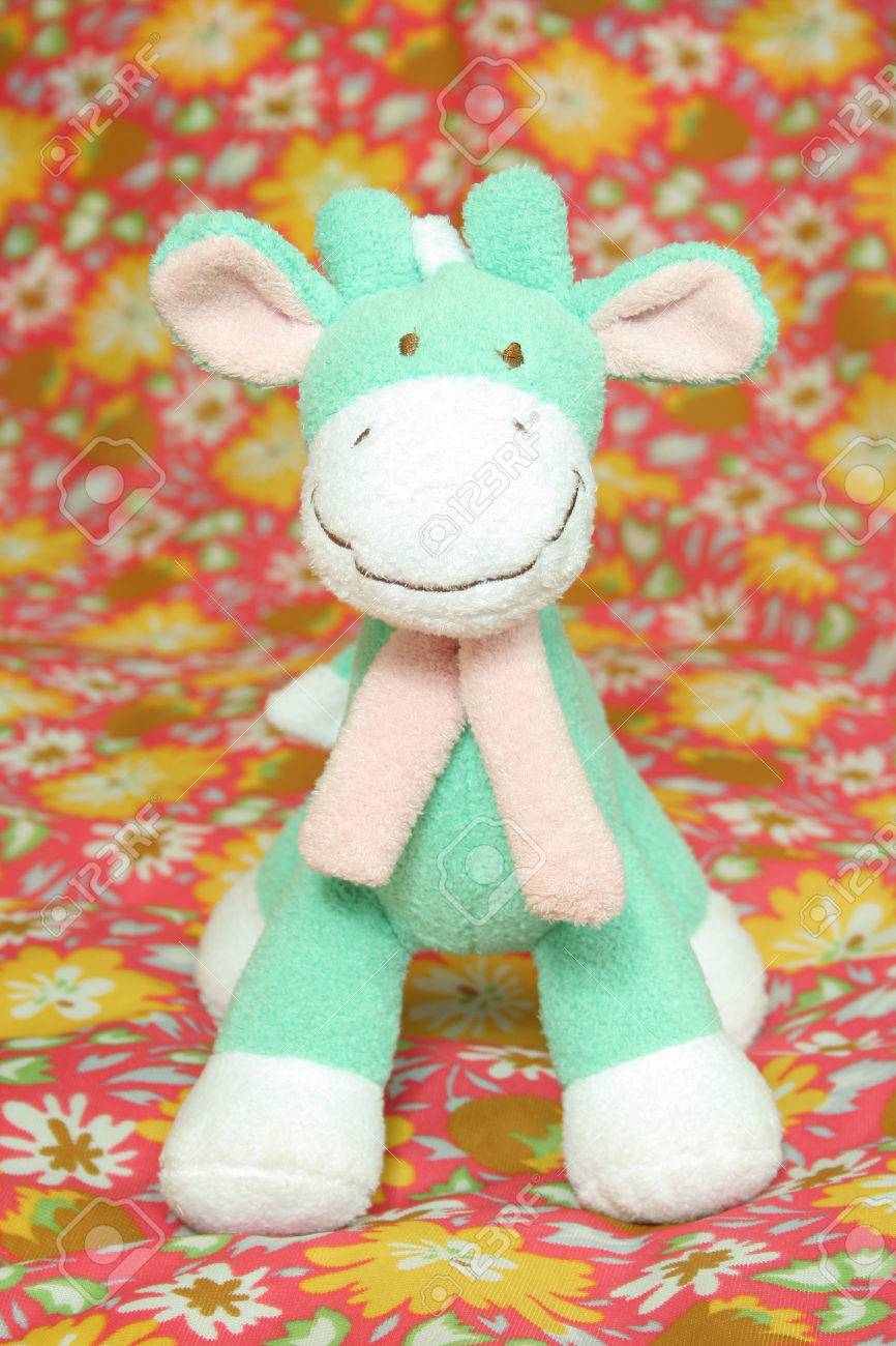 green giraffe stuffed animal