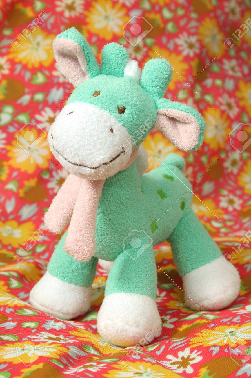 green giraffe stuffed animal