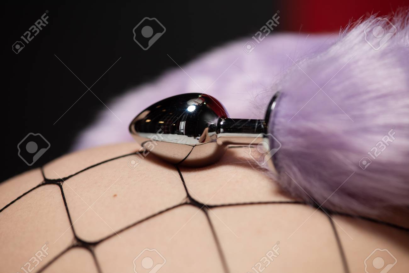 Anal Plug Sexy Device With Lilac Fur Close Up Stock Photo, Picture and  Royalty Free Image. Image 121819423.