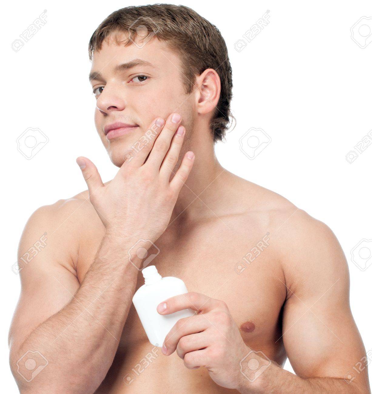 putting lotion on face
