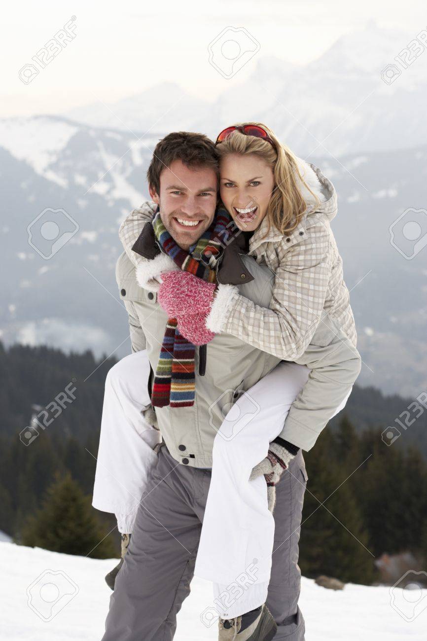 Young Couple On Winter Vacation - 11246527 Young Couple On Winter Vacation - 11246527