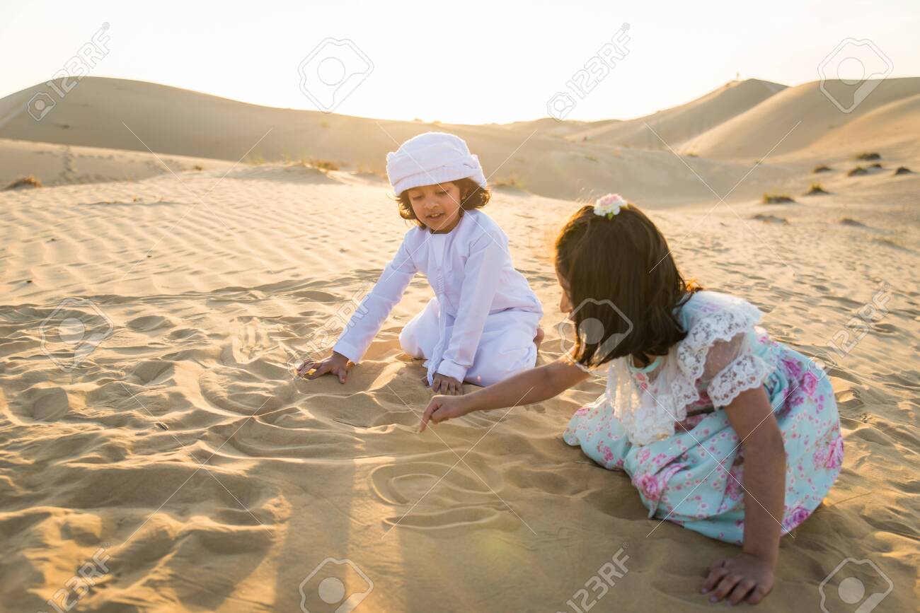 Arabian Family With Kids Having Fun In The Desert Parents And Stock Photo Picture And Royalty Free Image Image Arabian Family With Kids Having Fun In The Desert Parents And Stock Photo Picture And Royalty Free Image Image