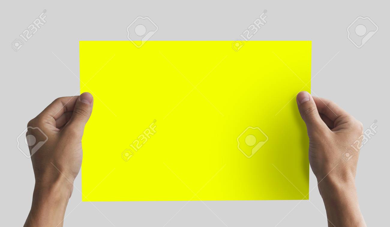 hand holding a4 paper in the hand leaflet presentation pamphlet
