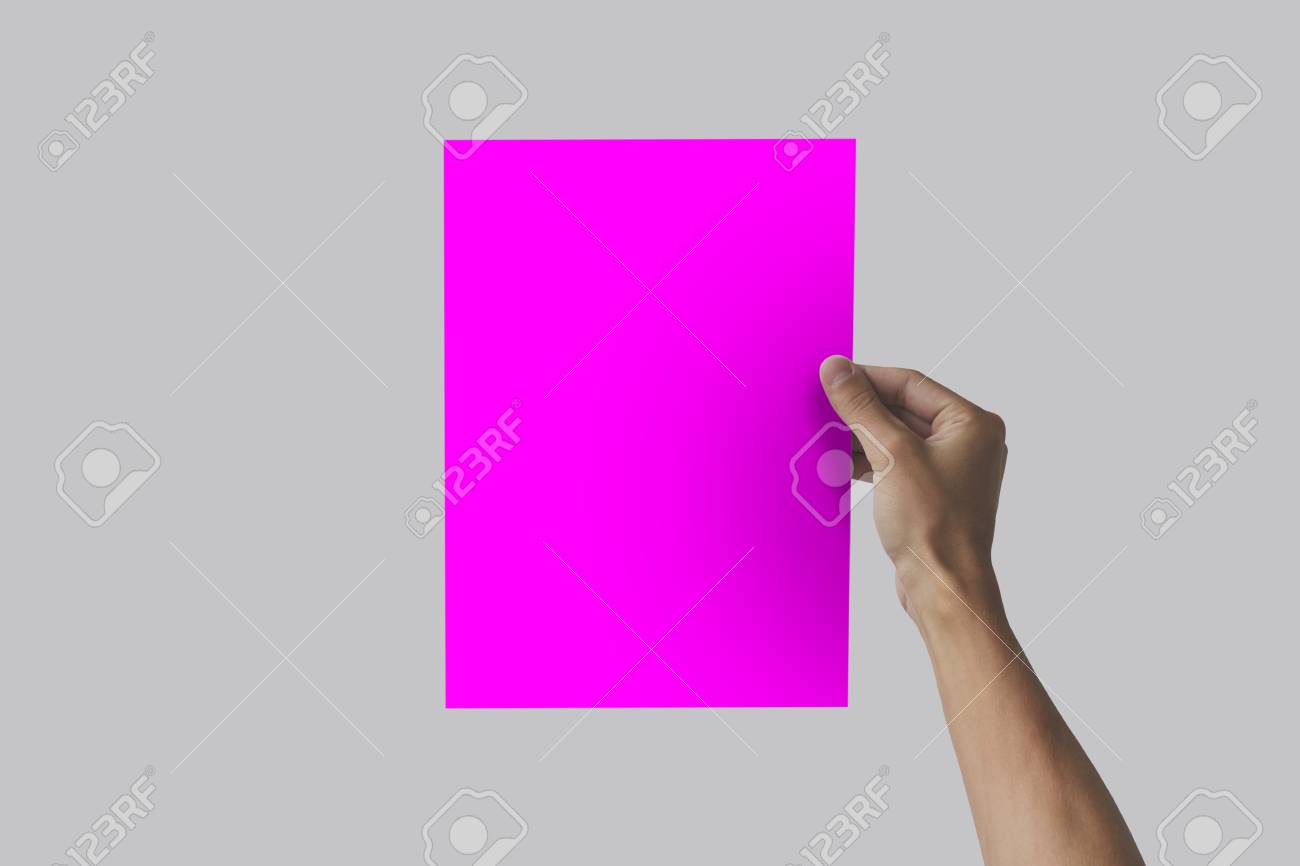 right hand holding a4 paper in the right hand leaflet presentation