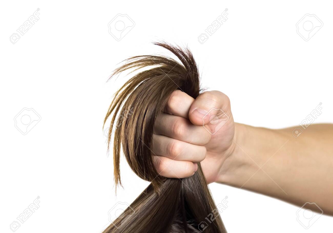 A Man's Hand Pulls A Woman's Hair. Close Up. Isolated On A White Background. Stock Photo, Picture And Royalty Free Image. Image 138258252. A Man's Hand Pulls A Woman's Hair. Close Up. Isolated On A White Background. Stock Photo, Picture And Royalty Free Image. Image 138258252.