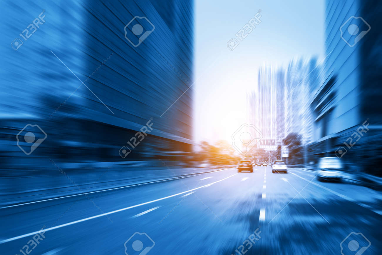 Motion blurred highway and skyscrapers in Shenzhen, China - 145384154 Motion blurred highway and skyscrapers in Shenzhen, China - 145384154