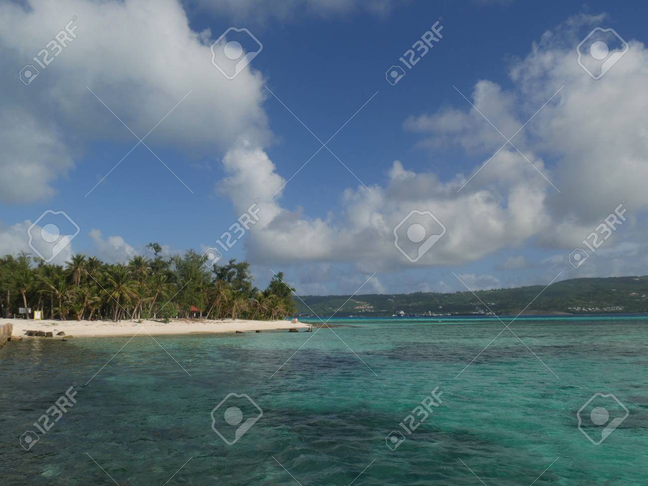 Crystal Clear Waters White Sandy Beaches And Beautiful Clouds