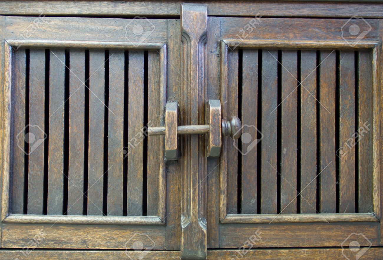 Wooden Door Latch On Antique Wooden Cabinets Stock Photo, Picture Stock Photo - Wooden door latch on Antique wooden cabinets - Wooden Door Latch On Antique Wooden Cabinets Stock Photo, Picture