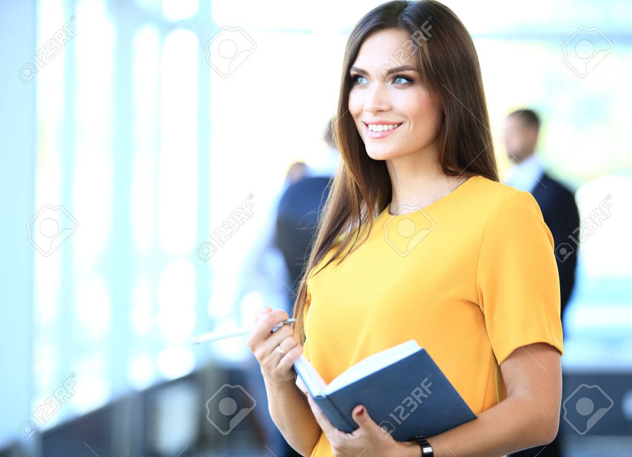 business woman with her staff, people group in background at modern bright office indoors - 48284607 business woman with her staff, people group in background at modern bright office indoors - 48284607