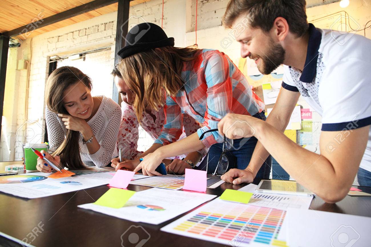 group of young business people , Startup entrepreneurs working on their venture in coworking space. - 73383401 group of young business people , Startup entrepreneurs working on their venture in coworking space. - 73383401