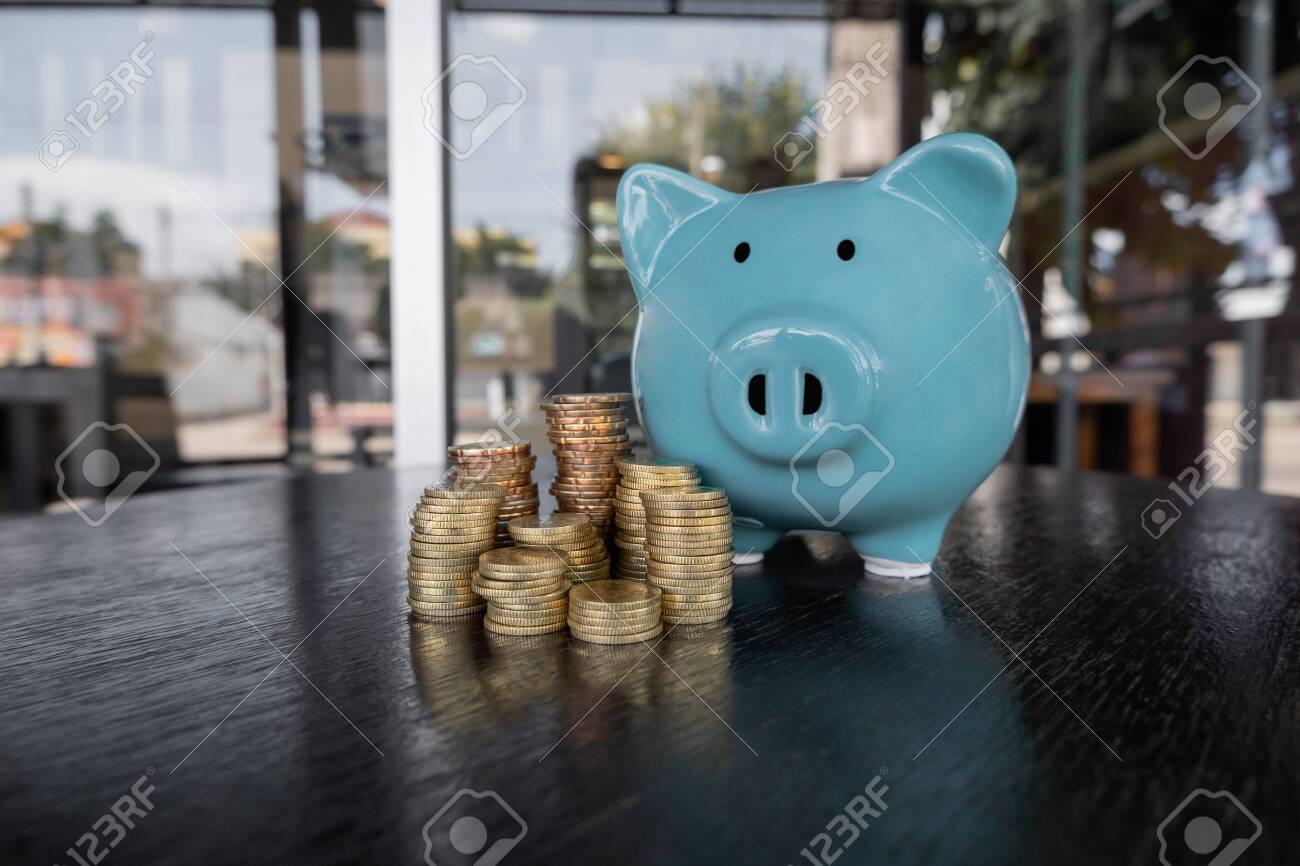Blue Piggy Bank With Coin Pile, Step Up Growing Business To Success And  Saving For Retirement Concept. Фотография, картинки, изображения и  сток-фотография без роялти. Image 132936161