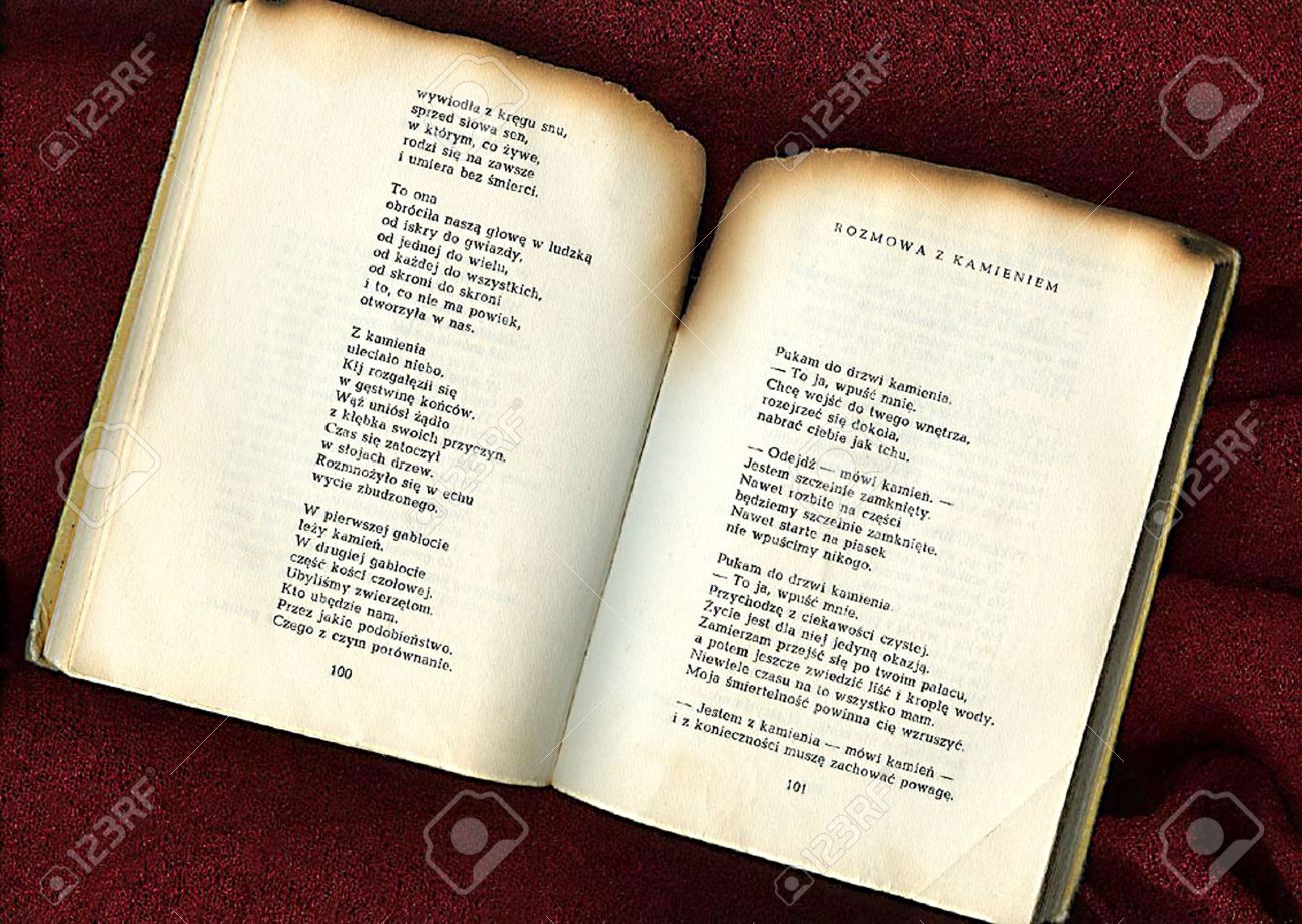 Open Poem Book With Burned Top Of The Pages Stock Photo, Picture And  Royalty Free Image. Image 4255485.