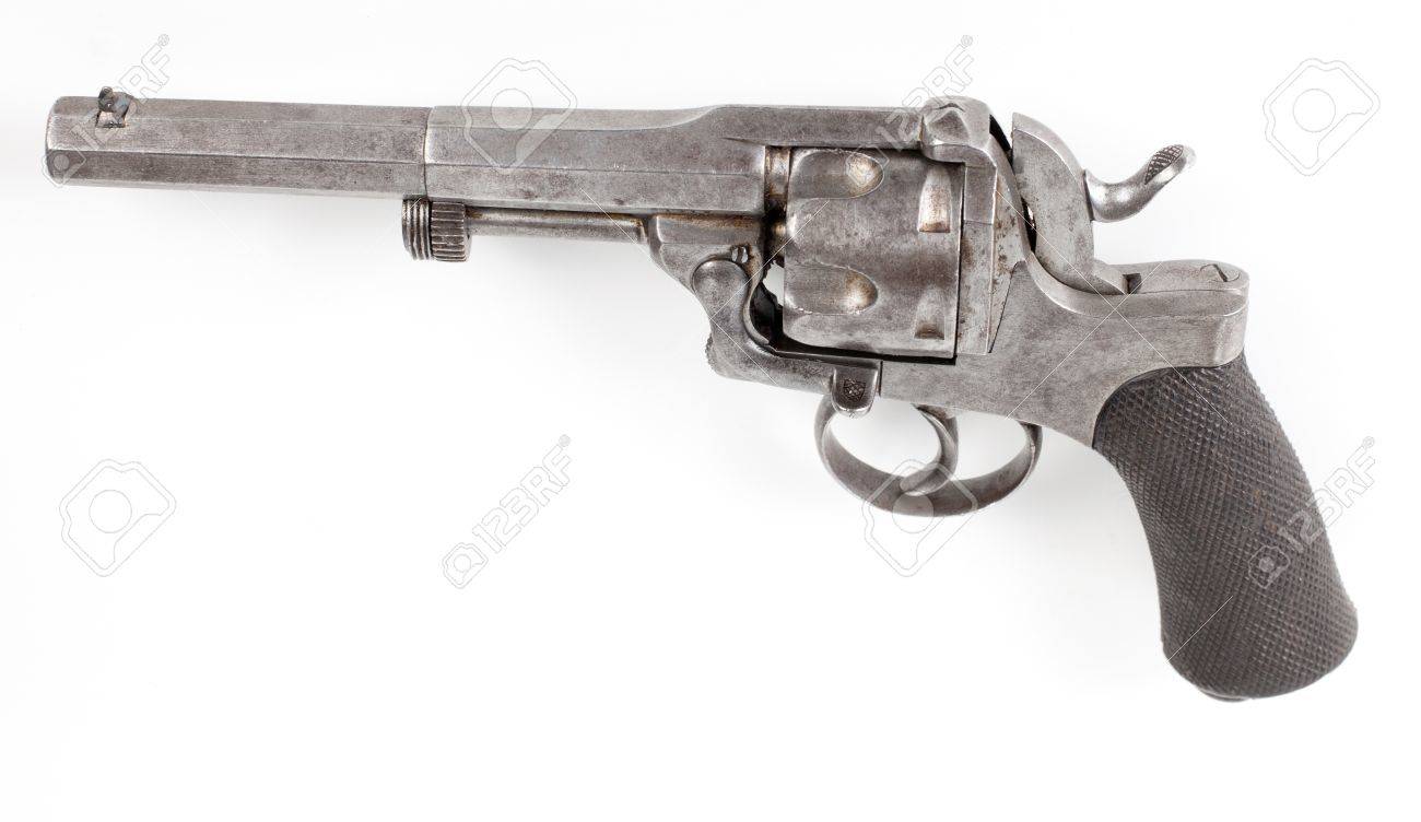 old silver color rusty pistol isolated on white background stock