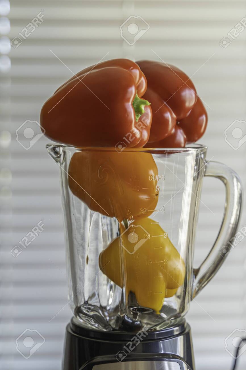 Tomatoes And Bell Peppers With Blender In Kitchen Stock Photo Picture And Royalty Free Image Image 129730374
