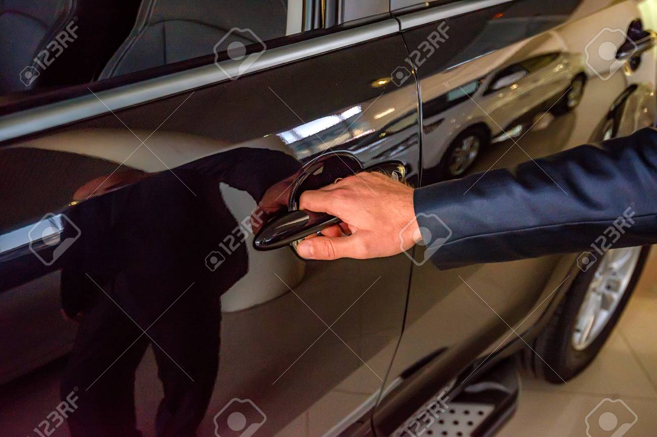 car door handle hand business man hand holding car doorhandle stock photo 88979423 man hand holding car doorhandle photo picture and car door handle hand business man hand holding car doorhandle stock photo 88979423 man hand holding car doorhandle photo picture and