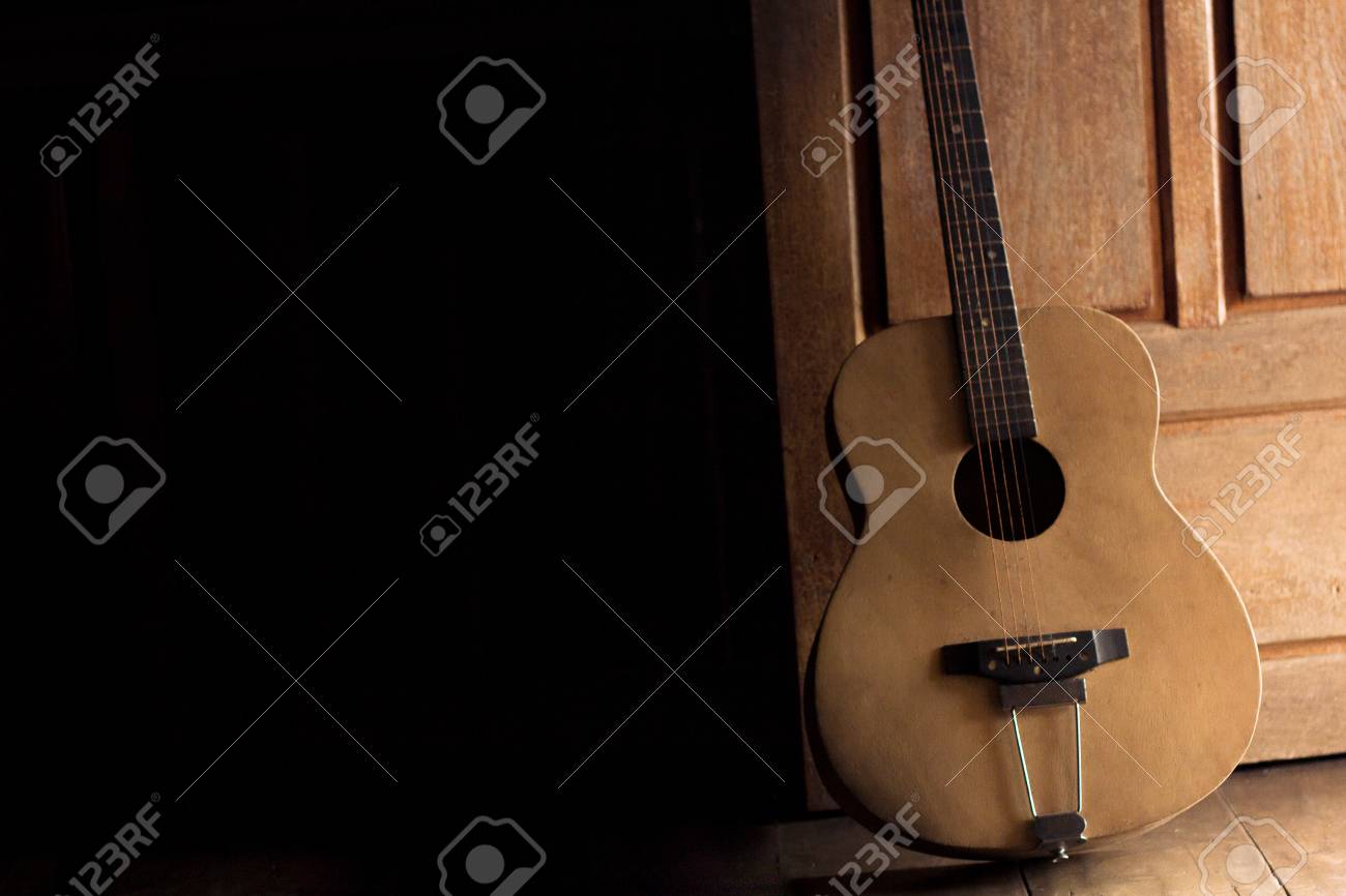 old wood guitar dark tone lack cable stock photo picture and
