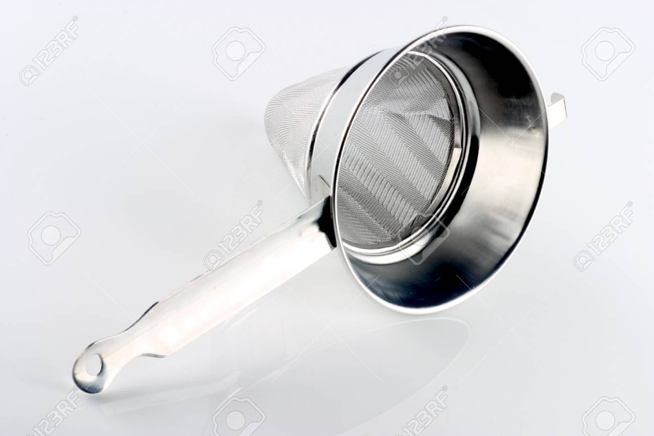 A chinoise (sometimes chinois) is an extremely fine meshed conical sieve used for straining soups and sauces to produce a very smooth texture. It can also be used to dust pastries with a fine layer of powdered sugar - 121743239 A chinoise (sometimes chinois) is an extremely fine meshed conical sieve used for straining soups and sauces to produce a very smooth texture. It can also be used to dust pastries with a fine layer of powdered sugar - 121743239