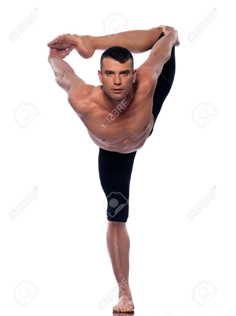 caucasian Man yoga asanas natarajasana dancer pose gymnastic.. caucasian Man yoga asanas natarajasana dancer pose gymnastic..