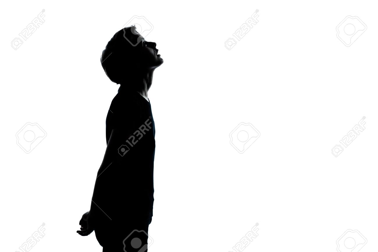 1 つの若い 10 代の白人シルエット男の子か女の子に孤立した白い背景をカット スタジオで肖像画を探しています の写真素材 画像素材 Image