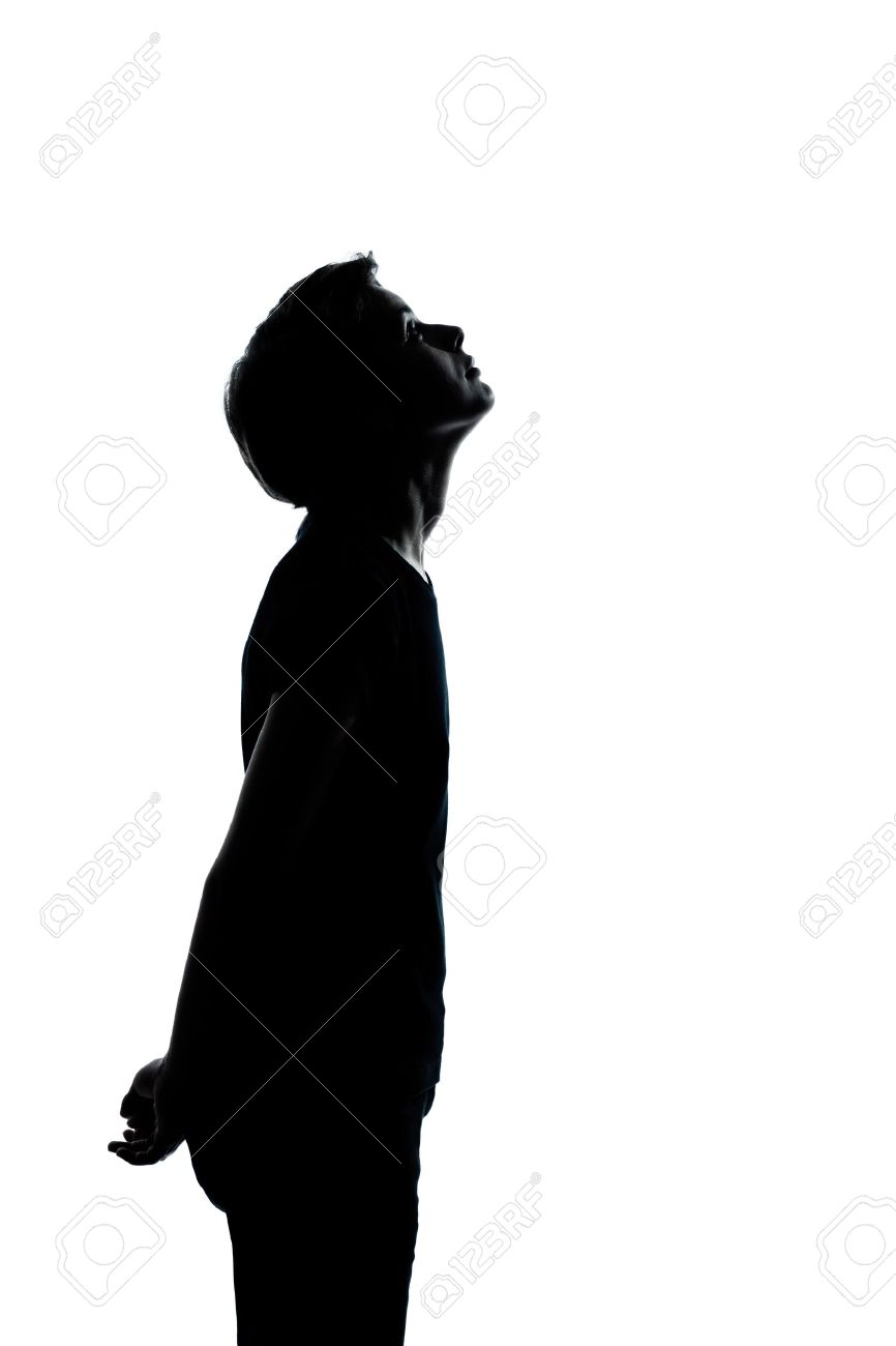 1 つ若い 10 代の白人シルエット男の子または女の子の肖像画スタジオでは 白い背景で隔離をカット の写真素材 画像素材 Image