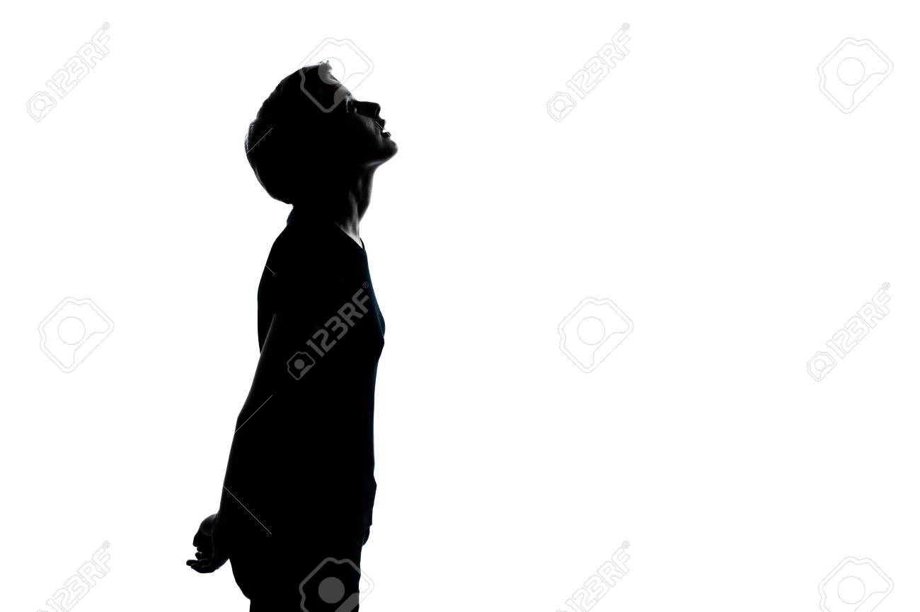 One Caucasian Young Teenager Silhouette Boy Or Girl Looking Up