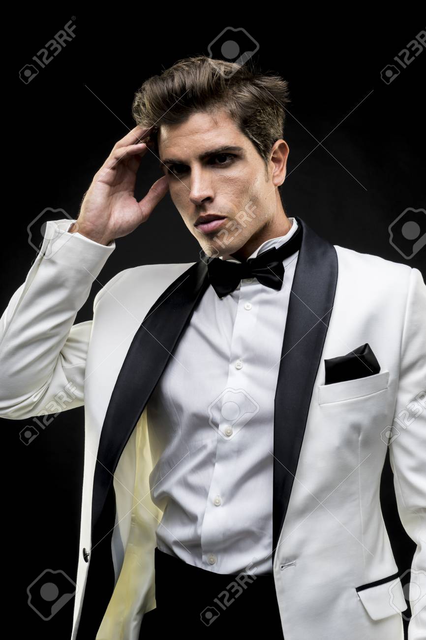 Luxury Elegant Man In A White Suit Tuxedo With Bow Tie Around Stock Photo Picture And Royalty Free Image Image