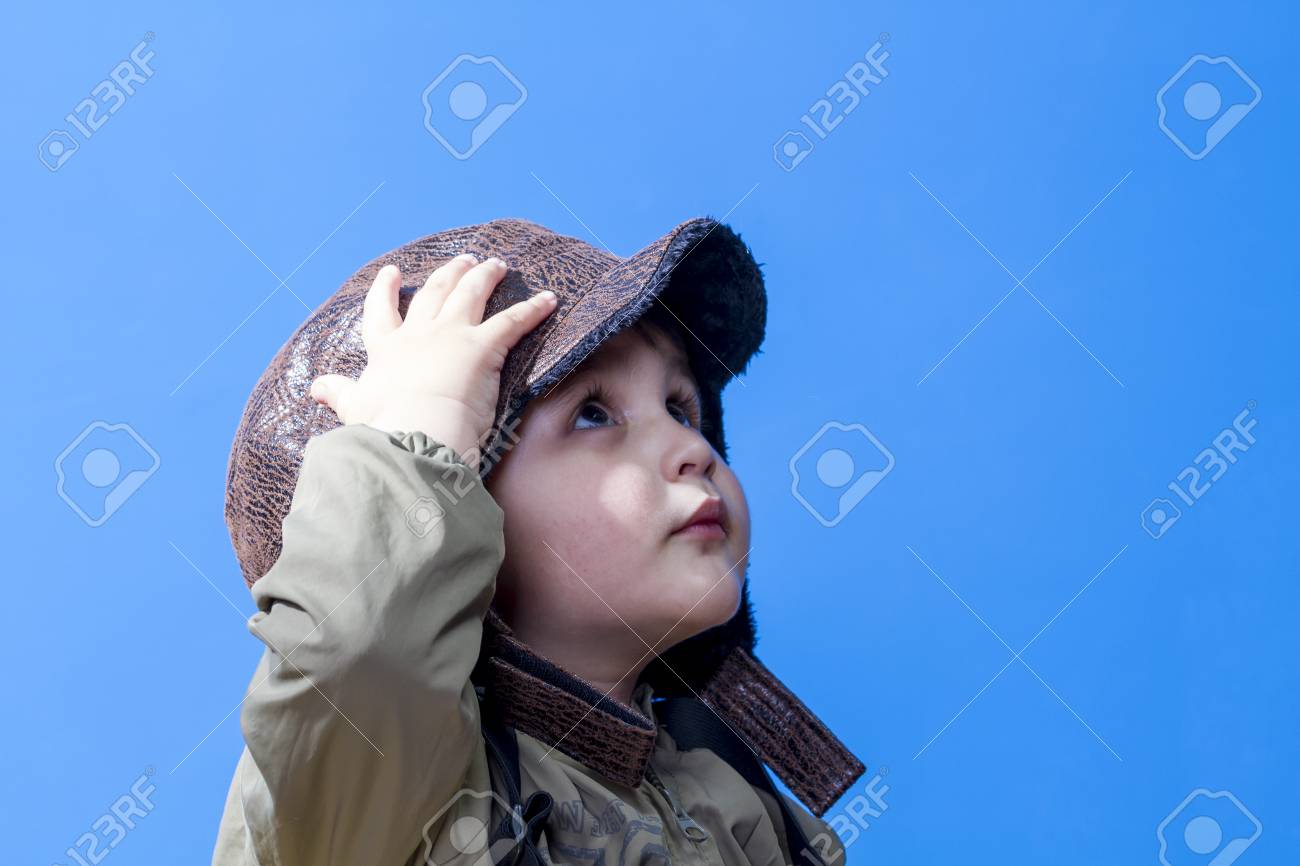 aviation fun and funny child dressed in aviator hat and goggles