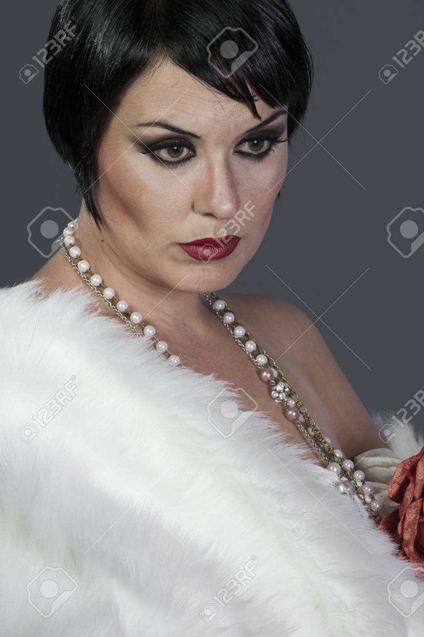 Flapper 1920s Style Brunette Dancer With Short Hair And Jewelry