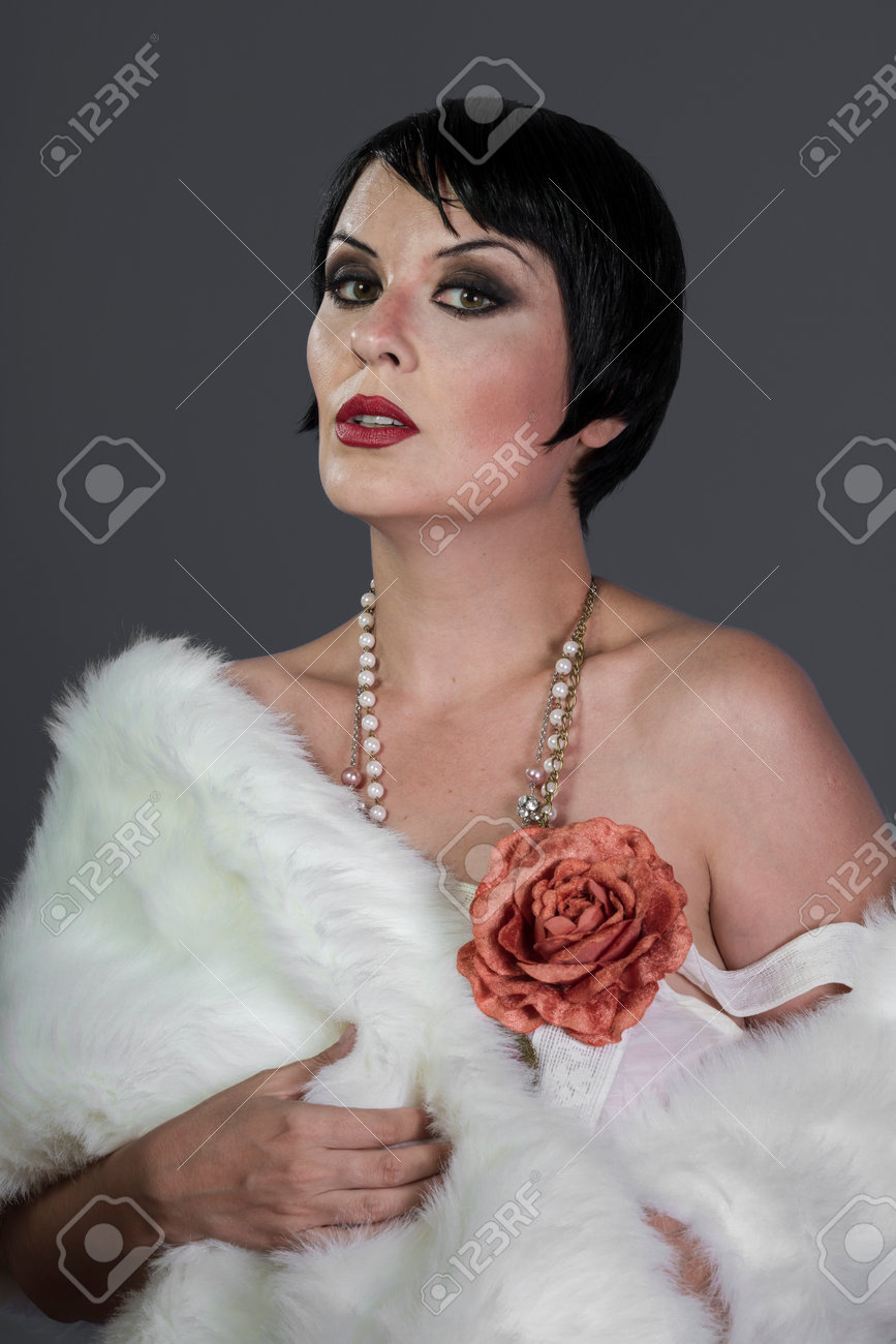 1920s Style Brunette Dancer With Short Hair And Jewelry She