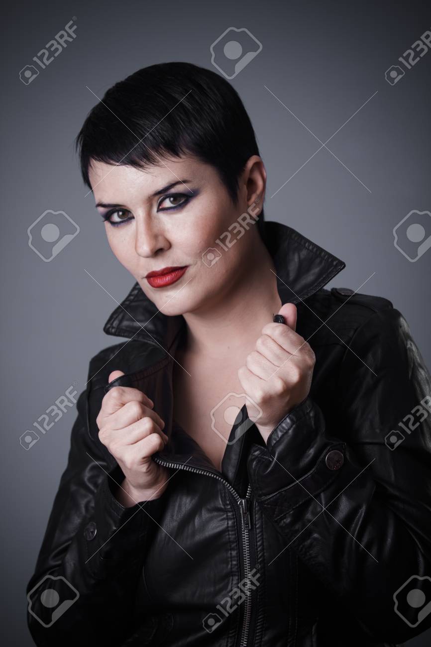 Brunette Woman Dressed In Leather Jacket Androgynous Appearance