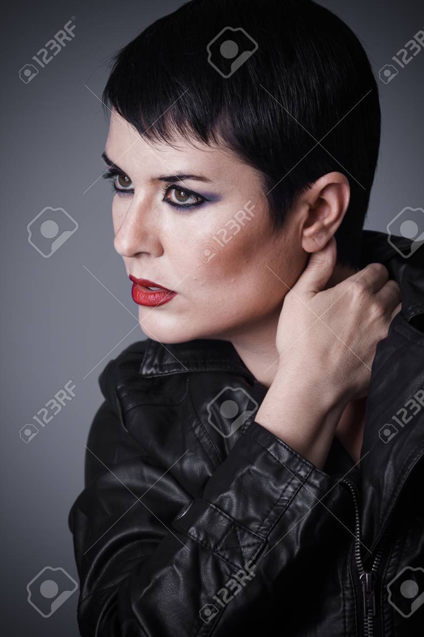 Haircut Brunette Woman Dressed In Leather Jacket Androgynous