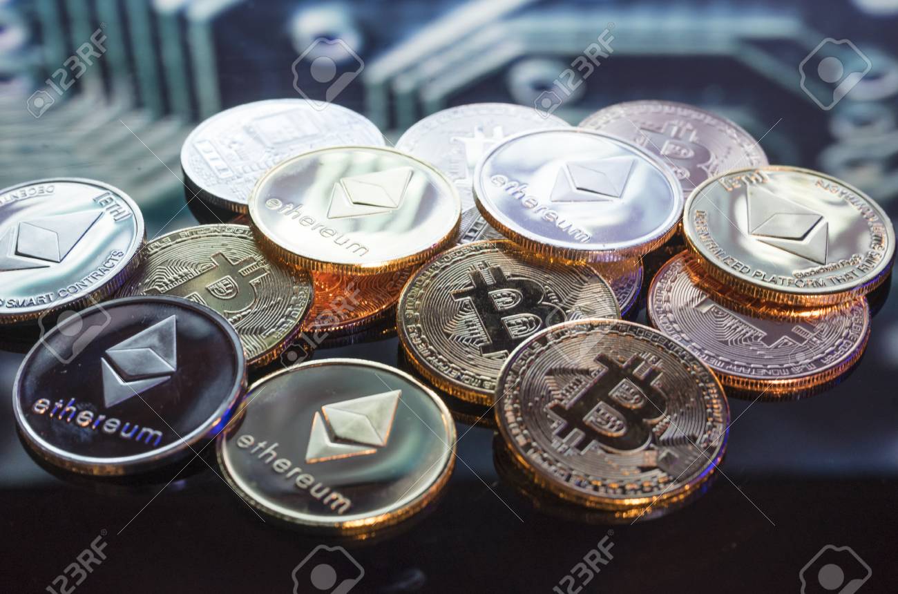 Bitcoin Gold, Silver And Copper Coins And Defocused Printed Circuit  Background. Virtual Cryptocurrency Concept. Stock Photo, Picture and  Royalty Free Image. Image 99935729.