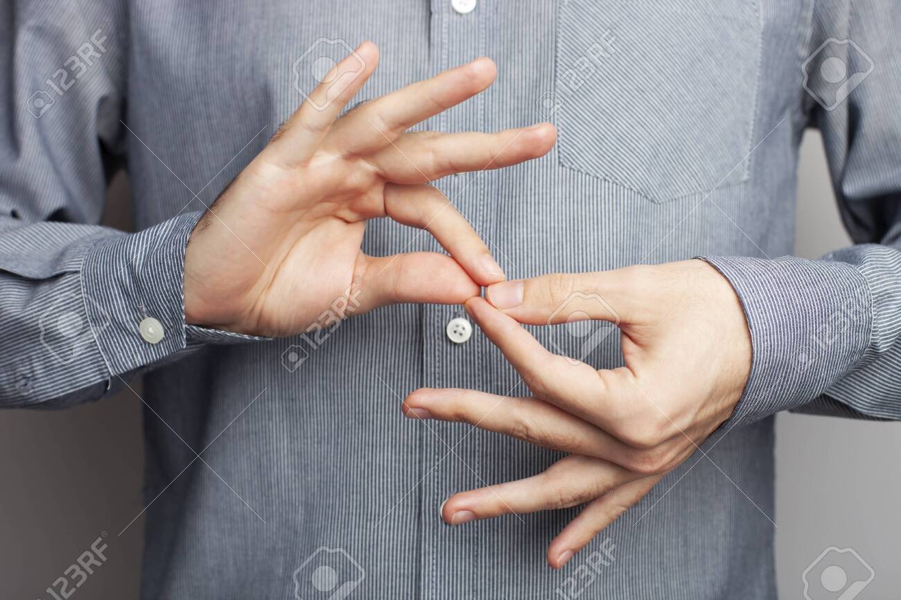 Man showing word interpreter, closeup view. American sign language - 134572916 Man showing word interpreter, closeup view. American sign language - 134572916