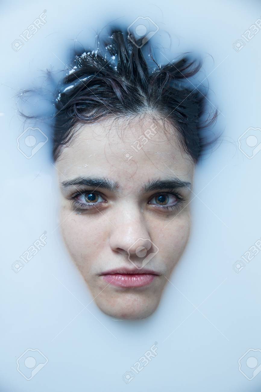 Portrait Of A Girl Without Makeup With Short Hair And Brown Eyes