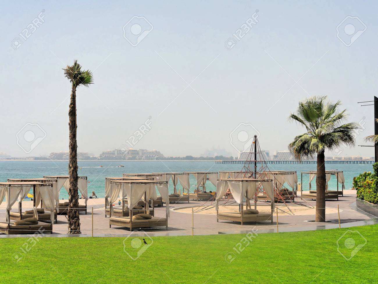 Jumeirah Beach With The Palm Jumeirah On Arabian Gulf In Dubai