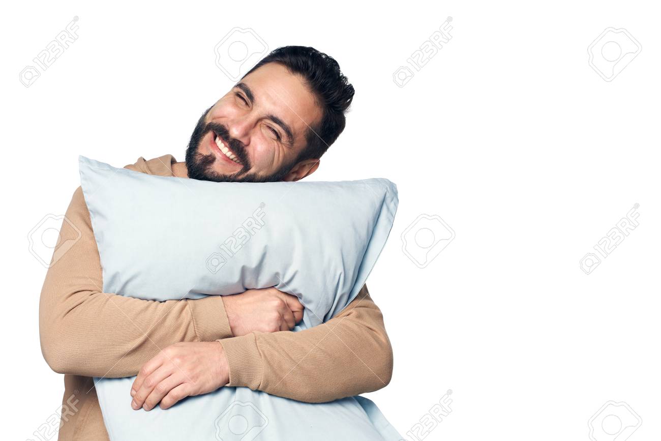 man holding pillow