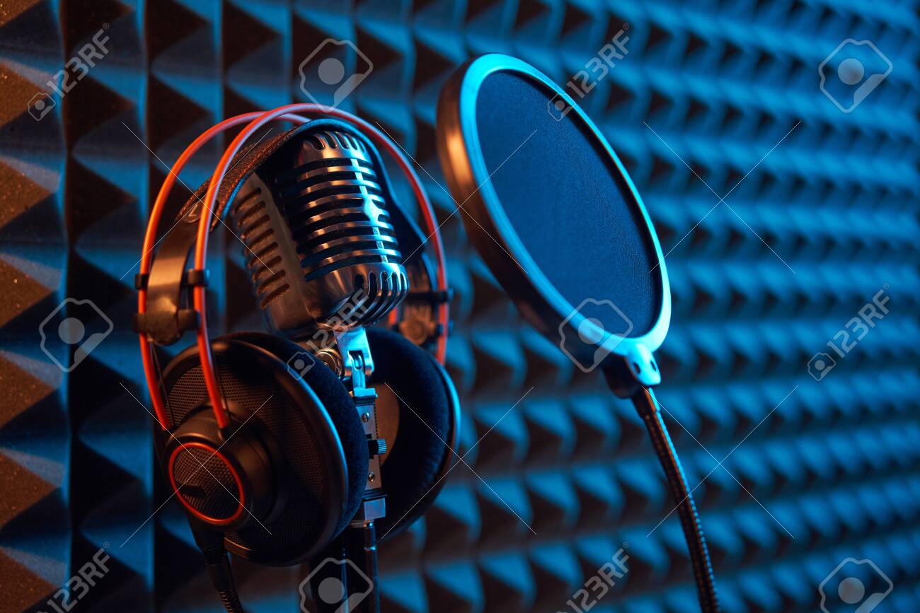 studio microphone and headphones studio microphone and headphones