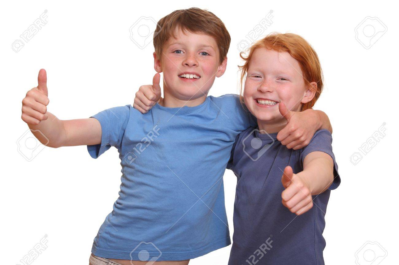Two Happy Young Kids With Thumbs Up Stock Photo Picture And