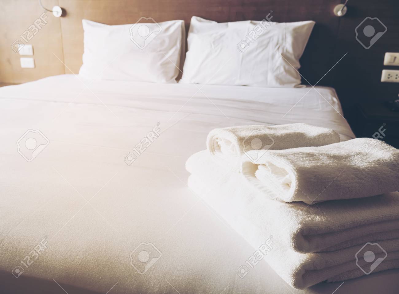 White Bedding And Towel Set In Modern Hotel