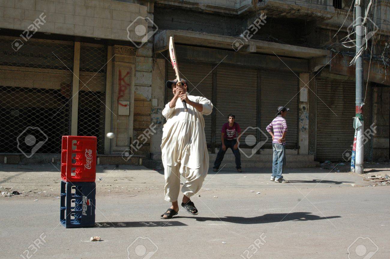 Karachi Pakistan_ Pakistani Playing Circket On Street Cricket Sport Is In Pakistani Blood Pakistani Do Karachi Pakistan_ Pakistani Playing Circket On Street Cricket Sport Is In Pakistani Blood Pakistani Do
