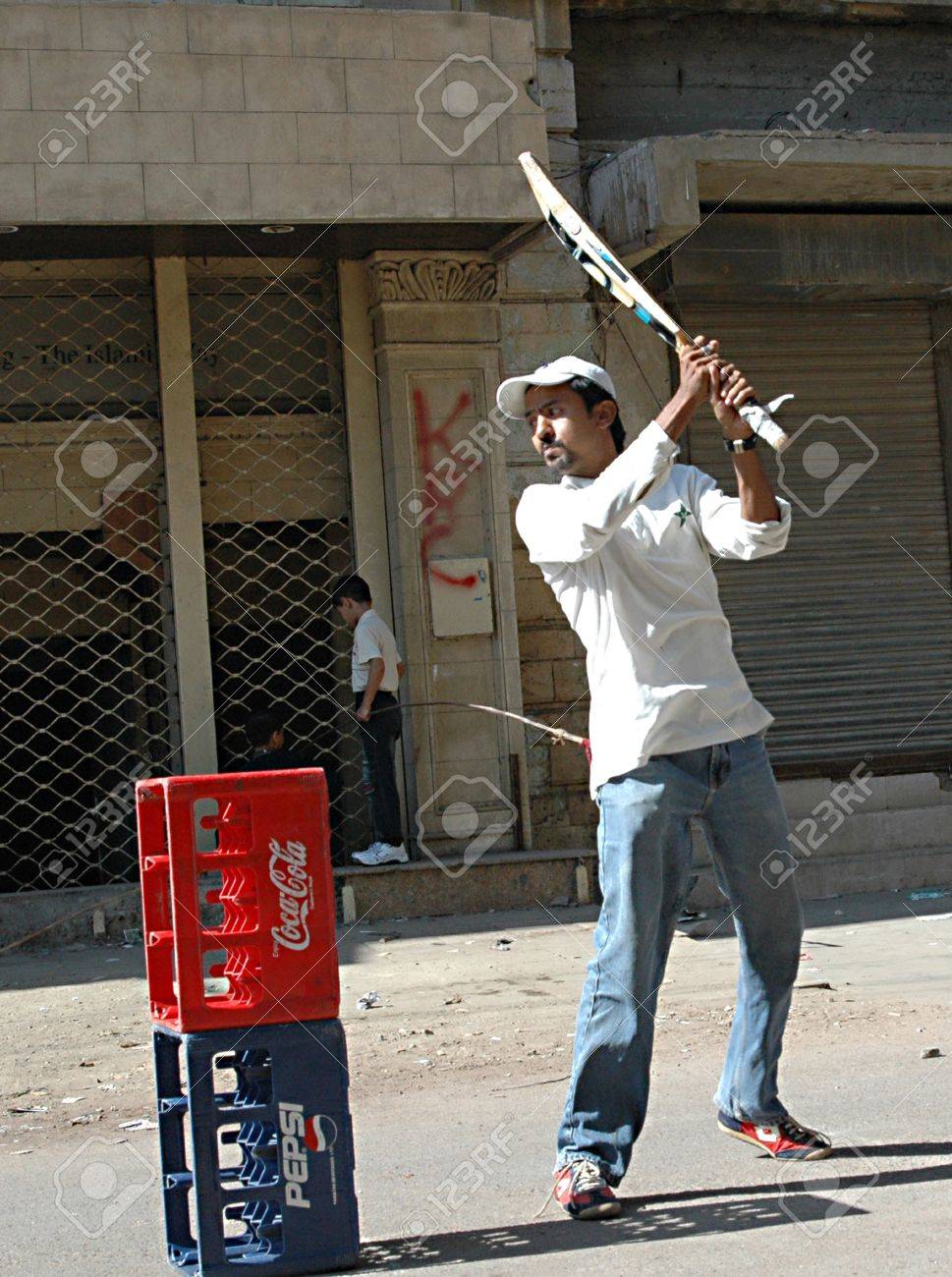 Karachi Pakistan_ Pakistani Playing Circket On Street Cricket Sport Is In Pakistani Blood Pakistani Do Karachi Pakistan_ Pakistani Playing Circket On Street Cricket Sport Is In Pakistani Blood Pakistani Do