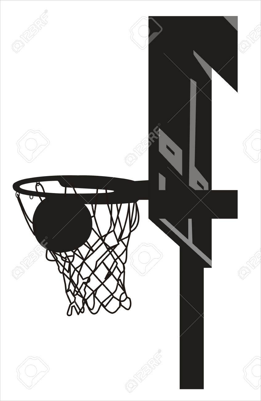 silhouette of a basketball going into the basket stock photo