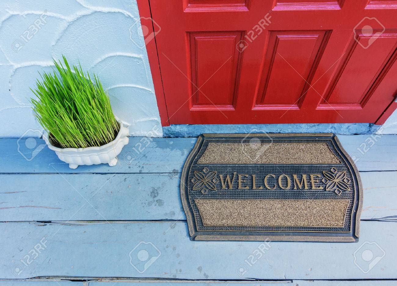 Welcome mat outside the front door - 69343989 Welcome mat outside the front door - 69343989