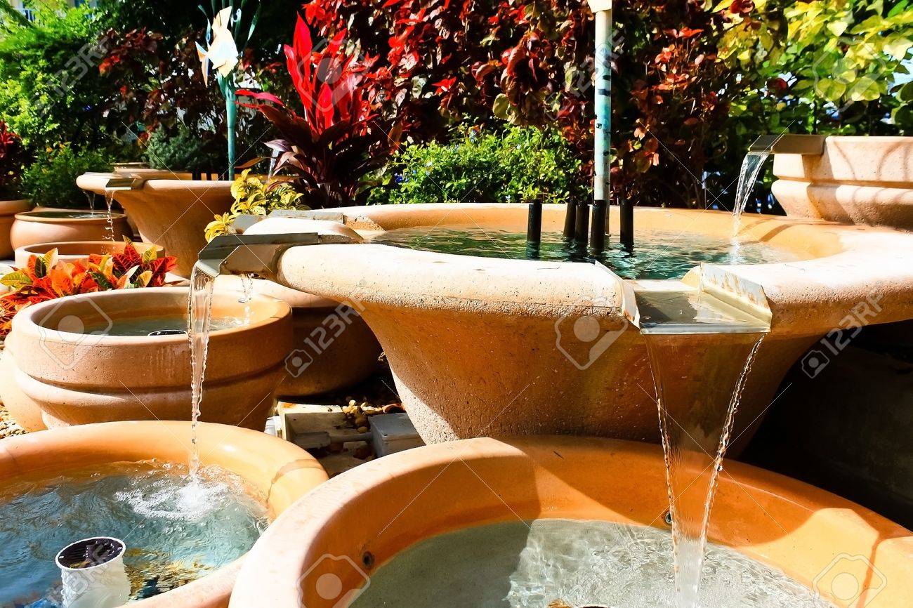 Tropical Man Made Water Fountain And Waterfall Stock Photo, Picture and  Royalty Free Image. Image 10776316.