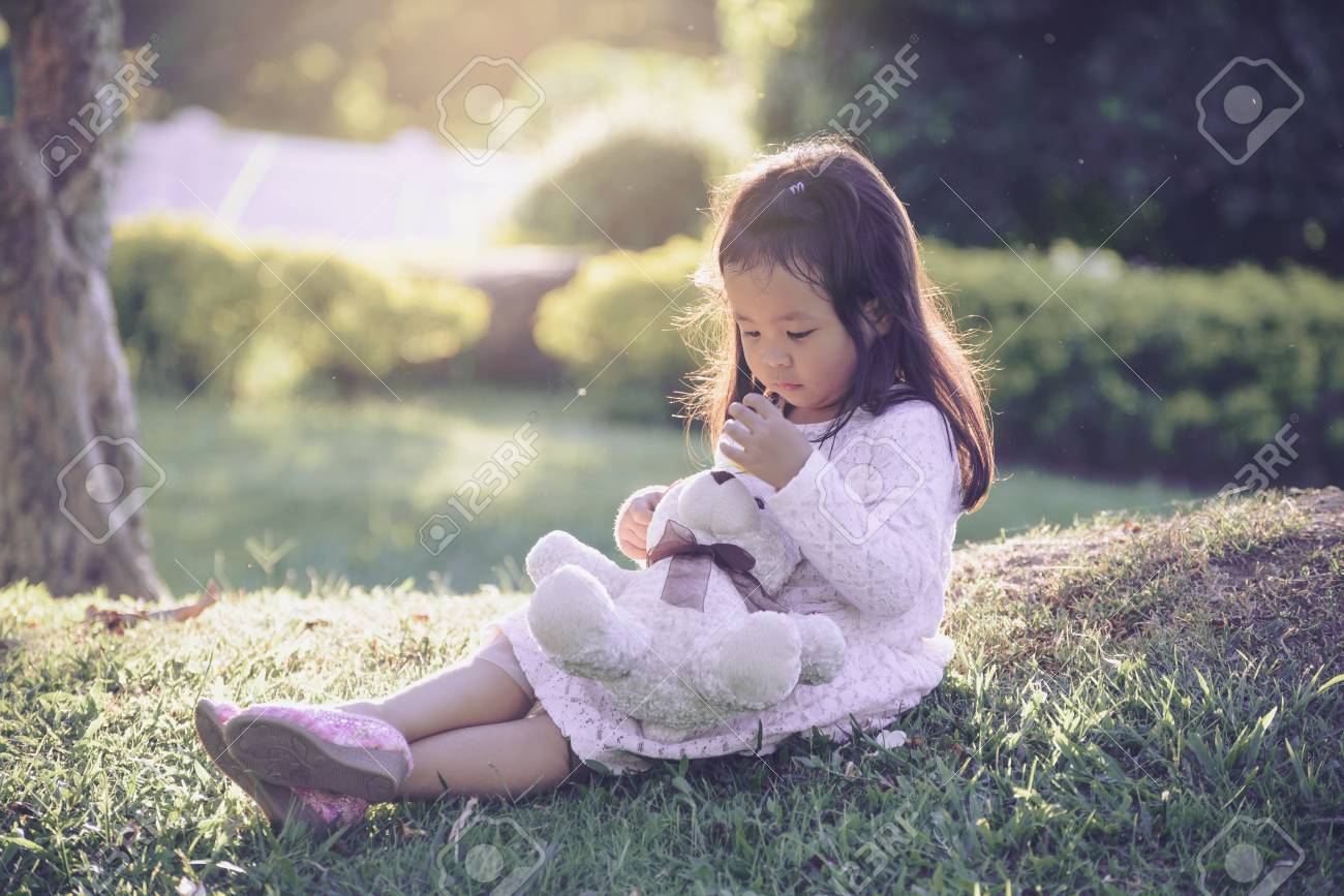 cute baby girl with teddy bear