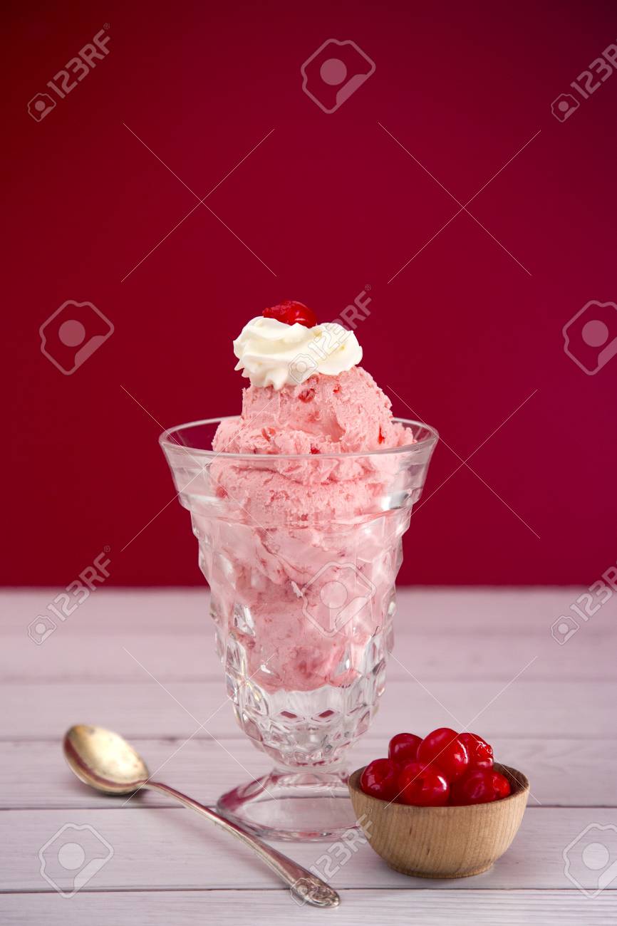 Cherry Ice Cream Sundae With Whipped Cream And A Cherry On Top Stock Photo,  Picture and Royalty Free Image. Image 104015477., image size:866x1300