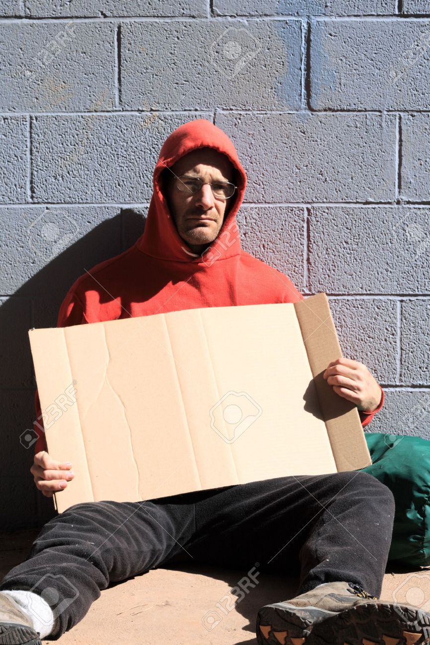Homeless Man In Red Sweatshirt Holding A Blank Cardboard Sign Stock Photo Picture And Royalty Free Image Image 3655672